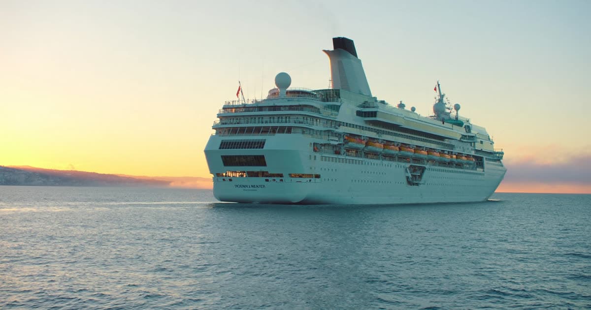 A cruise ship with a price curve motif across the sky