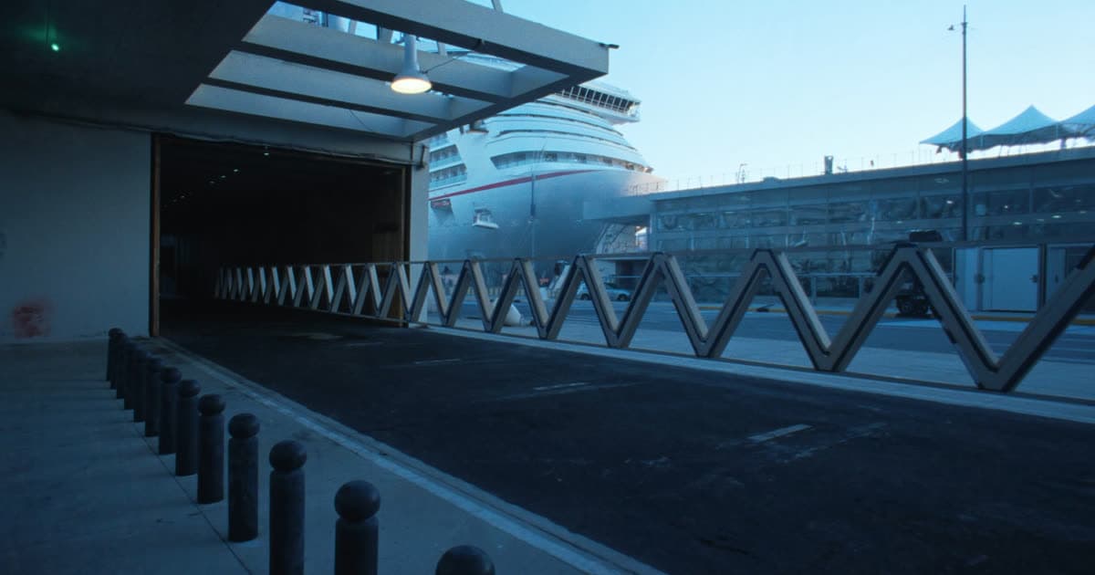 Travel documents beside a cruise terminal gangway