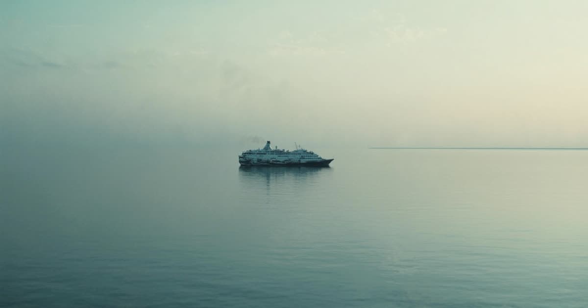 A stable cruise ship on gentle seas at dawn